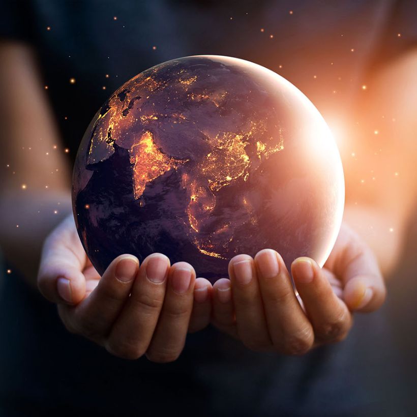 Sunny Earth in hands